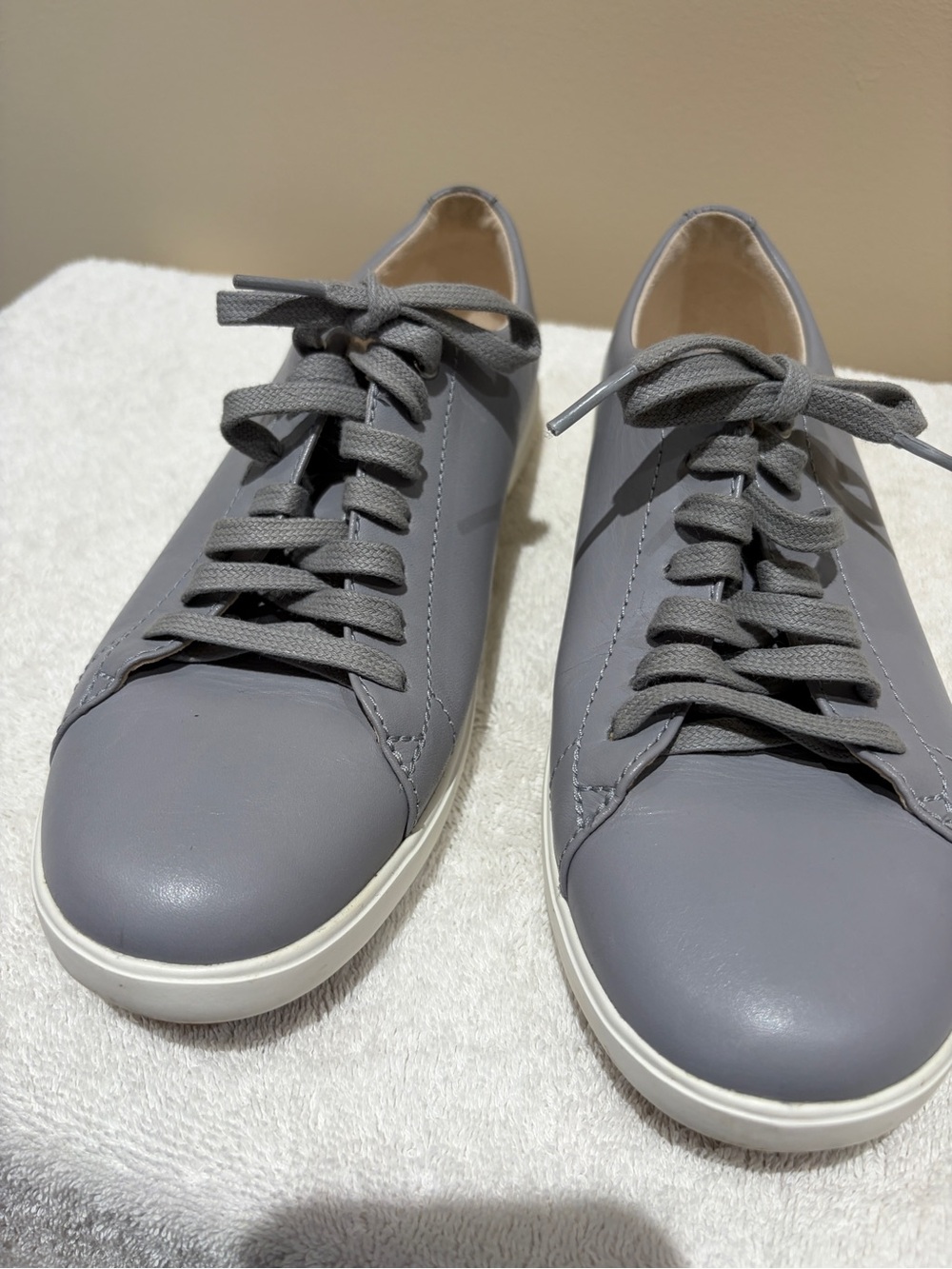 Cole Haan woman’s Gray Leather Low-Top Sneakers